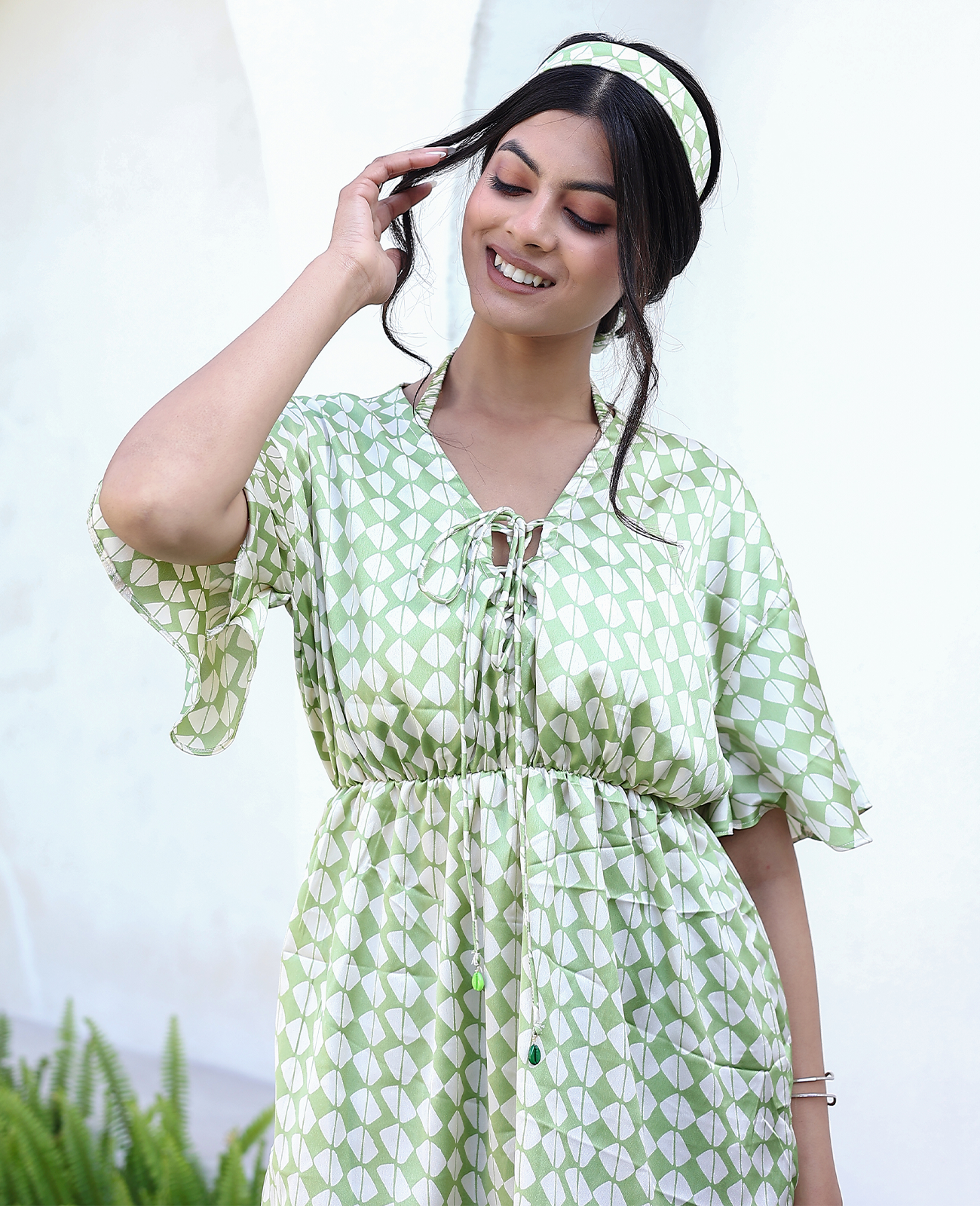 Mod Muse Tie-Front Romper with Flutter Sleeves